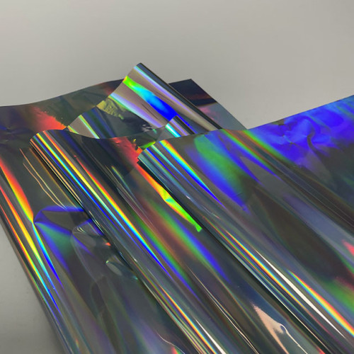 Efeito holográfico de película adesiva prateado cortado no