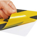 Autocollant antidérapant jaune et noir clouté avec inscription
