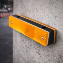 Wall Orange Reflector in black plastic - 1180x50x40mm