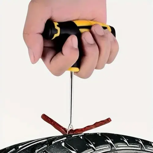 Inserimento della striscia nel pneumatico tubeless con l'ago a T