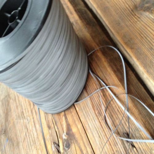 Banda reflectante plateada de coser en material PET - 100mt x