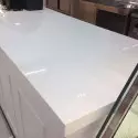 Transparent glossy adhesive film for protecting paint, tables