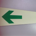 Phosphorescent adhesive tape with arrows