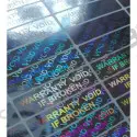 112 Adhesive and security hologram seals with double writing