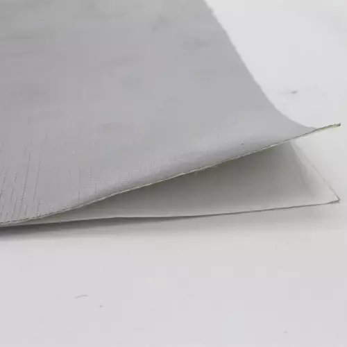 Panel termoadhesivo en fibra de vidrio y aluminio para el