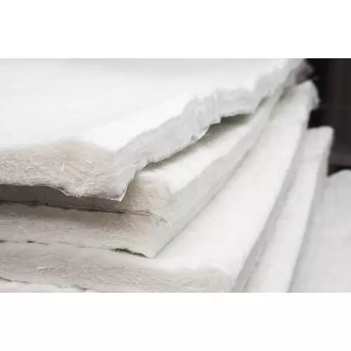 Felt panel in quilted glass fiber and high temperature