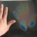 Liquid crystal thermochromic adhesive sheet that changes color