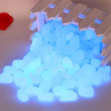 Fluorescent and luminous blue sky resin pebbles glow in the
